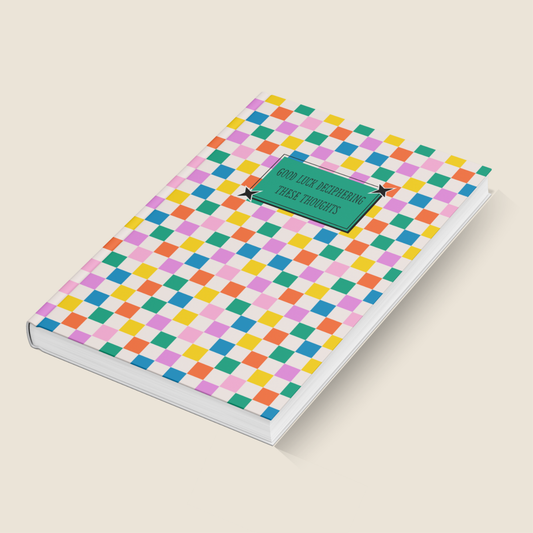 Lined A5 notebook with vibrant geometric cover design and playful typography