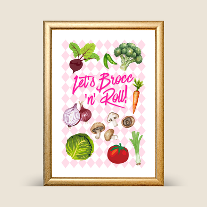 Framed artwork with illustrations of vegetables and text 'Let's Brocc 'n' Roll!' on a checkered background.