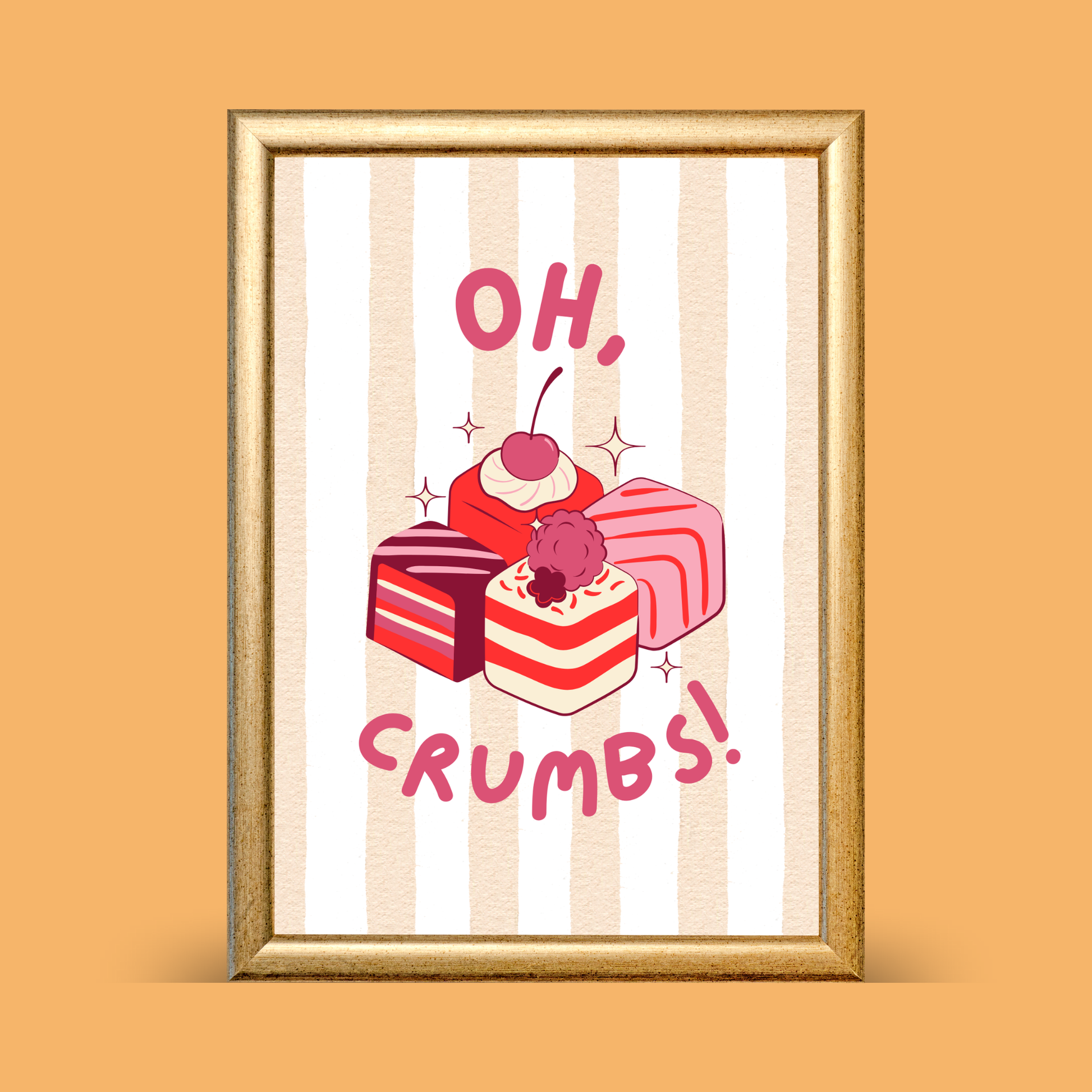 Cute cake illustration print with pink and red layered cake slices and the text “Oh, crumbs!” on a striped background, displayed in a gold frame on a warm neutral backdrop.