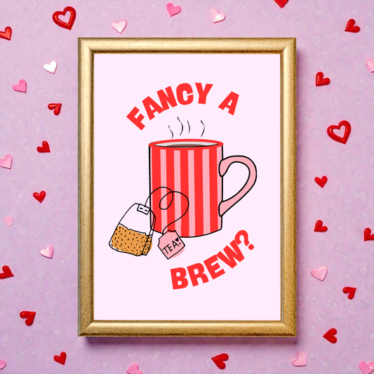 Framed artwork with a red striped mug and tea bag on a pink background with heart shapes.