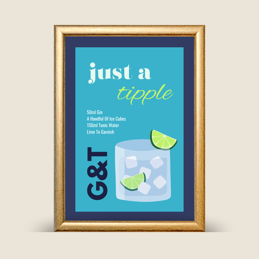 Framed ‘Just a Tipple’ gin and tonic cocktail illustration print featuring a blue background, a gin and tonic glass with ice and lime, displayed against a neutral background.
