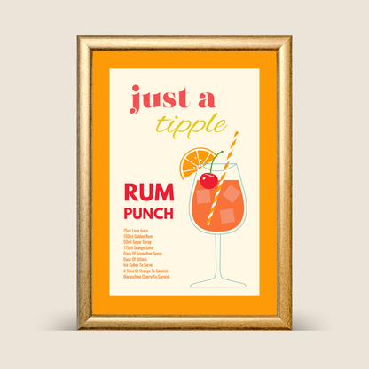 Framed rum punch cocktail recipe wall art featuring an orange and cream design, illustrated cocktail glass with orange slice and cherry, shown on a neutral background.