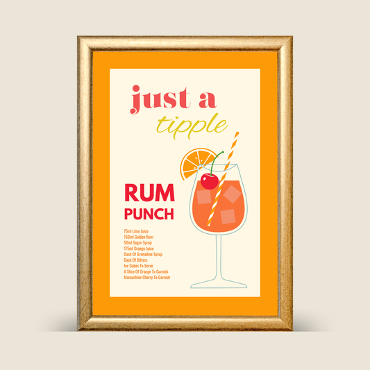 Framed rum punch cocktail recipe wall art featuring an orange and cream design, illustrated cocktail glass with orange slice and cherry, shown on a neutral background.